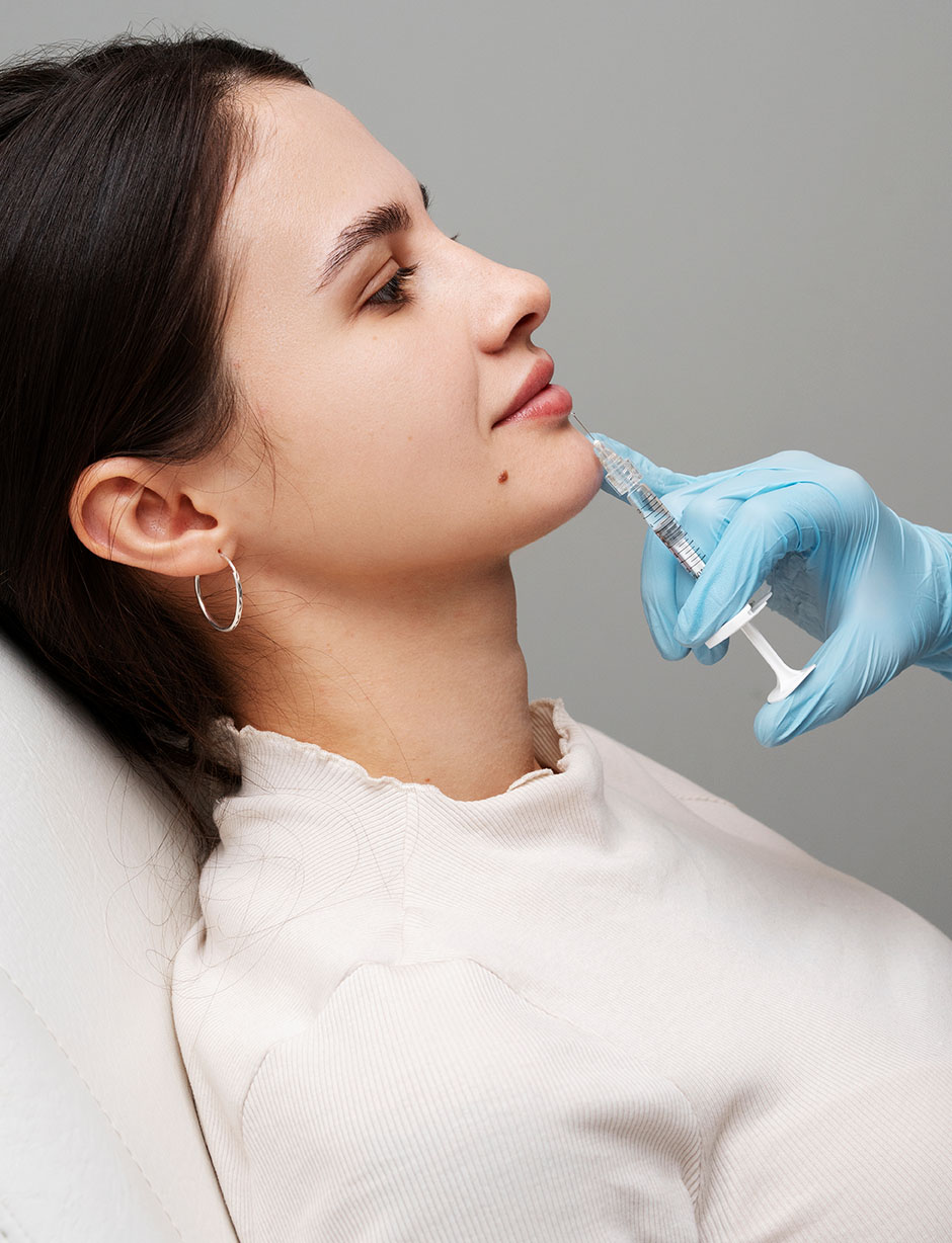 woman getting lip fillers